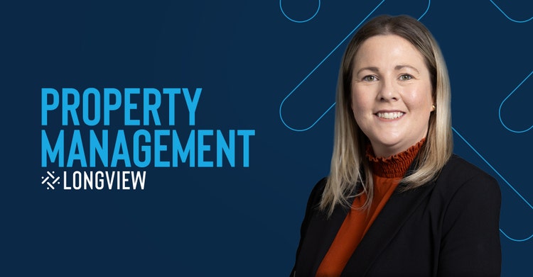 Woman with glasses smiling with a house and Longview logo