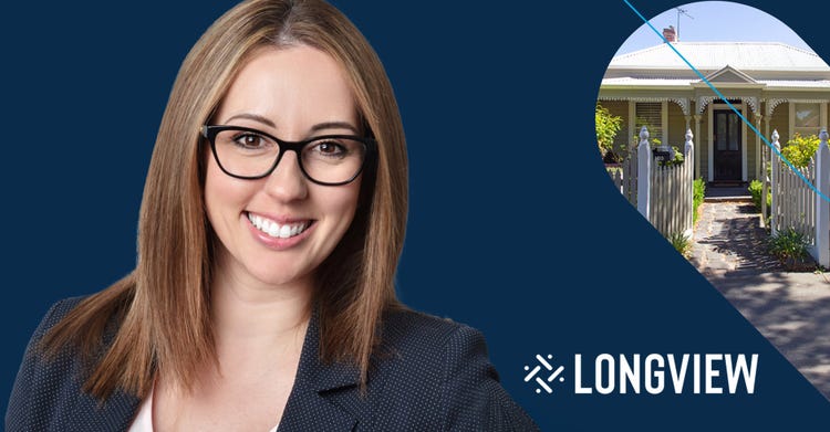 Woman with glasses smiling with a house and Longview logo